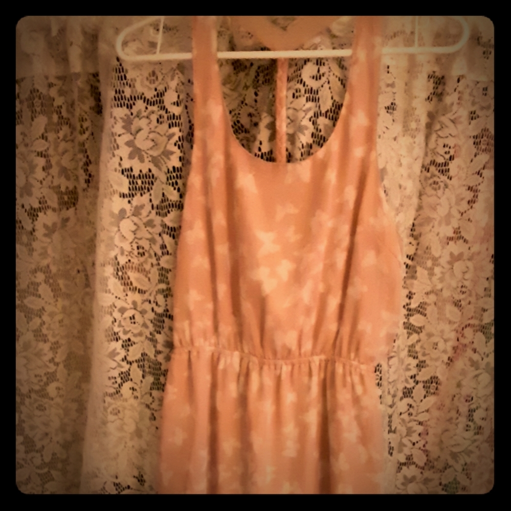 Tan color dress with butterflies.  Long dress.